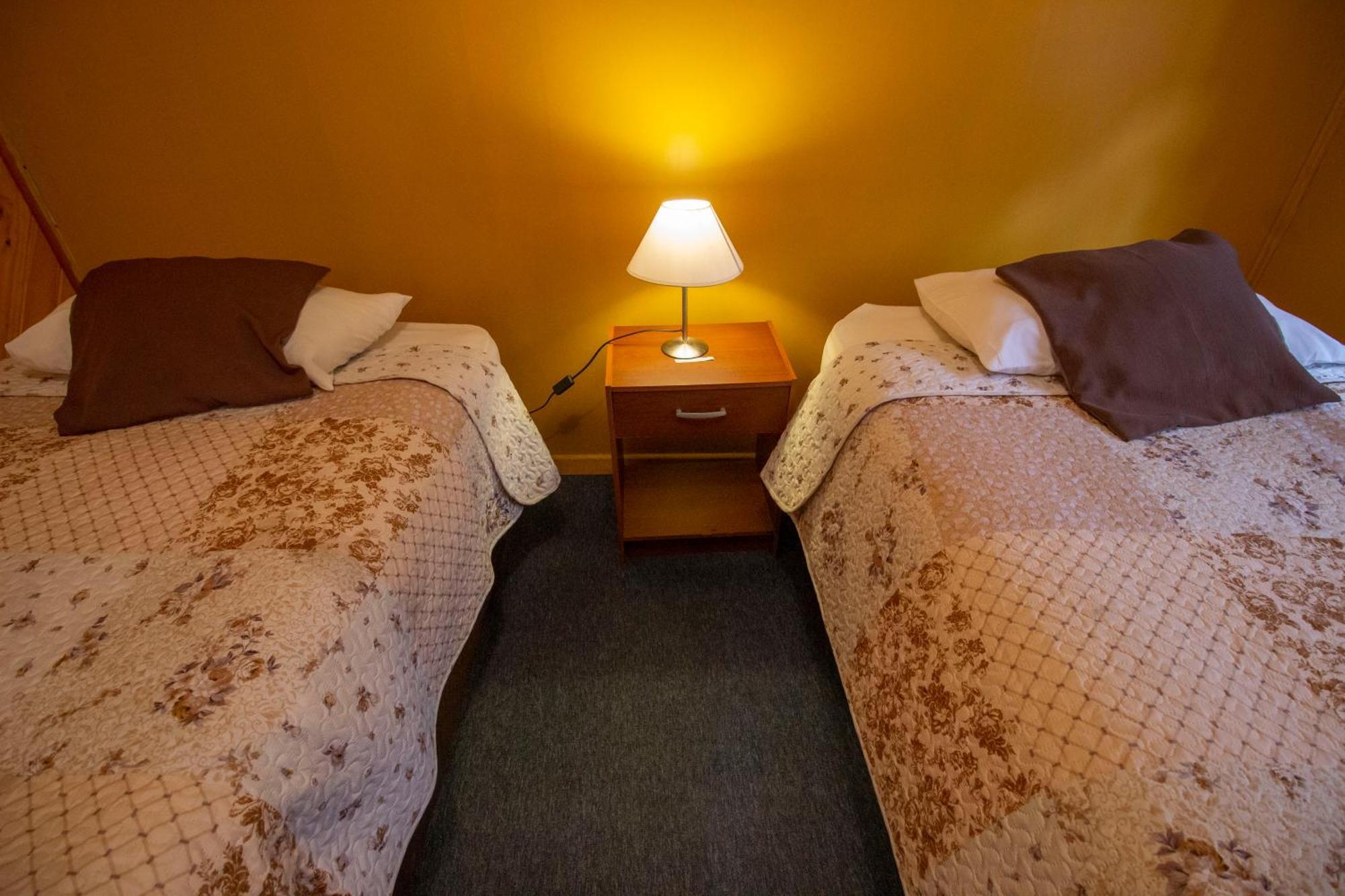 Apart Hotel Y Cabanas Valle Exploradores 푸에르토 트란퀼로 외부 사진
