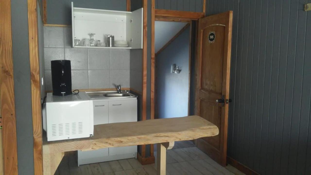 Apart Hotel Y Cabanas Valle Exploradores 푸에르토 트란퀼로 외부 사진